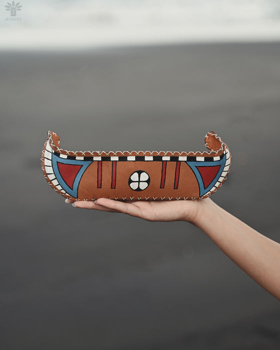 Handcrafted shamanic bag made from authentic buffalo leather, shaped like a symbolic boat for spiritual journeys.