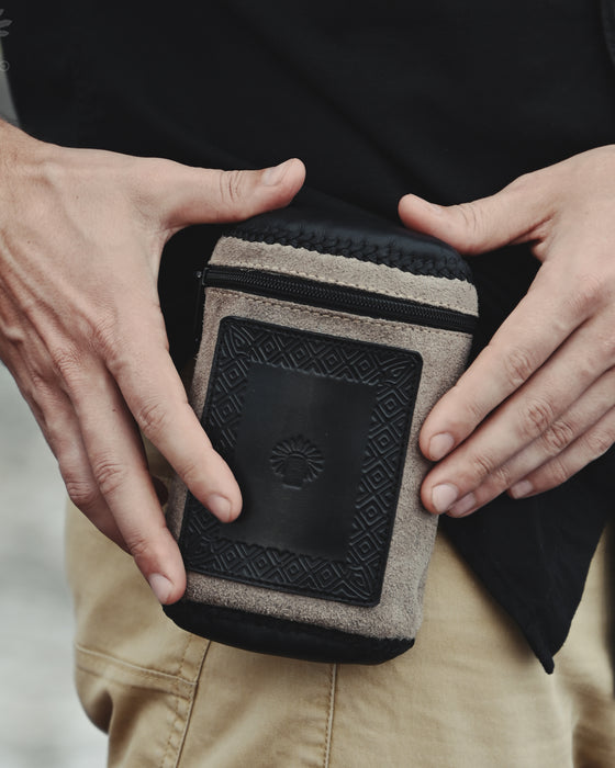 Handmade leather pouch with a belt clip, ideal for storing Rapeh, Kuripe, or small personal items during ceremonies.