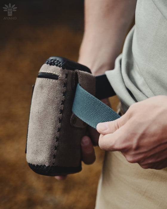 Handmade leather pouch with a belt clip, ideal for storing Rapeh, Kuripe, or small personal items during ceremonies.