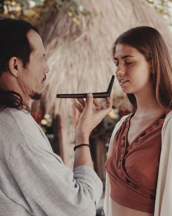 This handcrafted rose wood Tepi Kuripe from Bali is a portable tool for Hape, designed for shamanic practices and spiritual meditation.