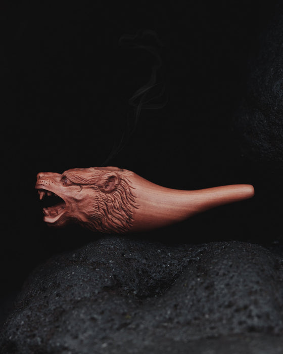 Artistic smoking pipe featuring a captivating lion design, sure to be a conversation starter among friends and fellow smokers.