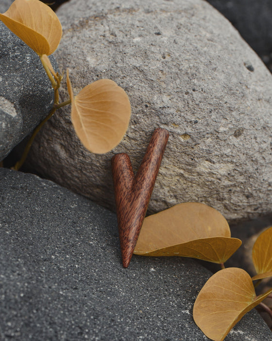 Collection of coconut wood kuripes, showcasing different designs and patterns available.