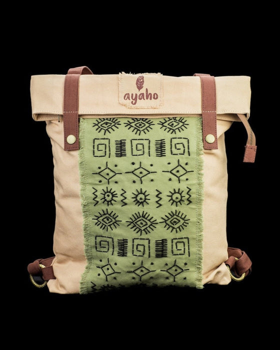 Artisanal ethnic style backpack crafted from natural canvas, featuring distinctive embroidery for the bohemian spirit, ideal for daily ventures and festivals