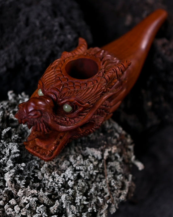 Exquisite wood smoking pipe with a dragon theme, perfect for collectors and enthusiasts alike.