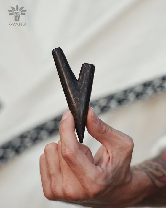 Handcrafted palm wood kuripe, emphasizing the quality and craftsmanship involved in its creation