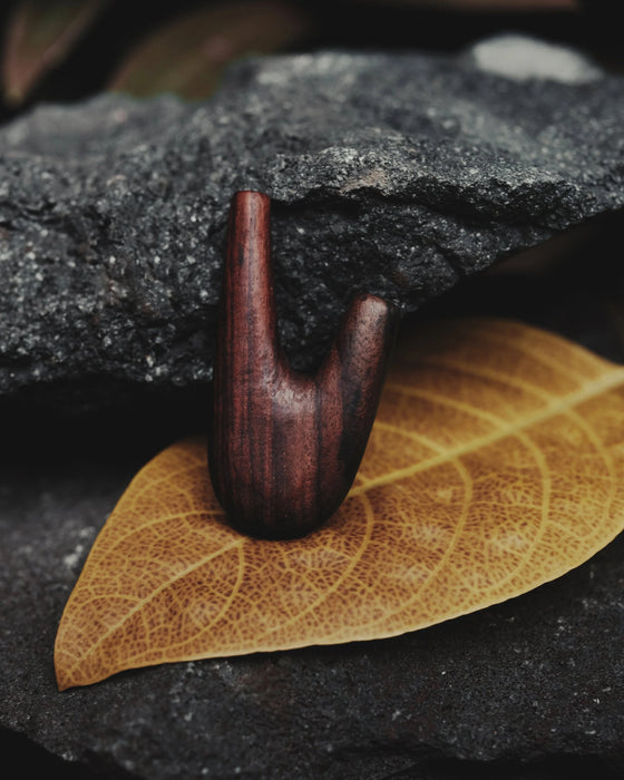 Discover the spiritual essence of the shamanic ritual with this handmade Kuripe pipe, a unique tool for Rapéh ceremonies. Crafted from rosewood and adorned with sacred geometry,  a special gift imbued with healing and protection