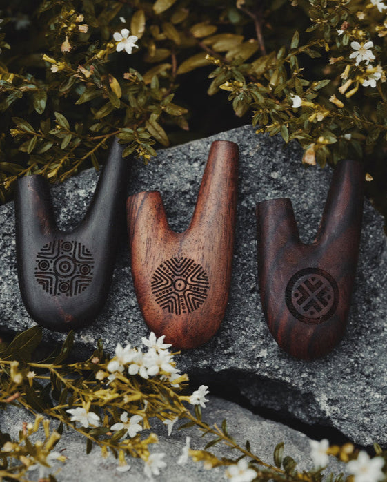 Discover the spiritual essence of the shamanic ritual with this handmade Kuripe pipe, a unique tool for Rapéh ceremonies. Crafted from rosewood and adorned with sacred geometry,  a special gift imbued with healing and protection