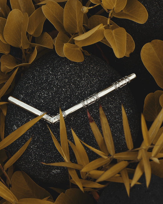 Silver Tepi, an elegant spiritual tool designed to enhance your meditation and healing practices with its beautiful design.