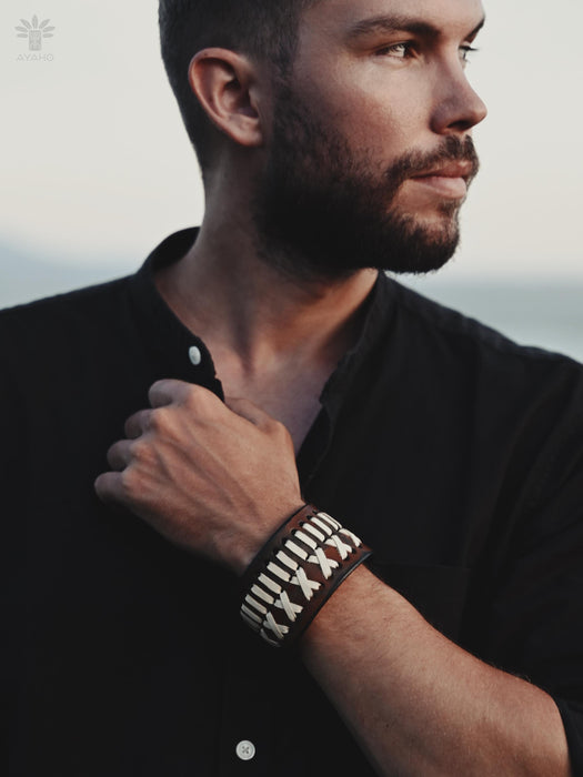 Ethnic-style buffalo leather bracelet, raw and bold, representing grounded energy and resilience.
