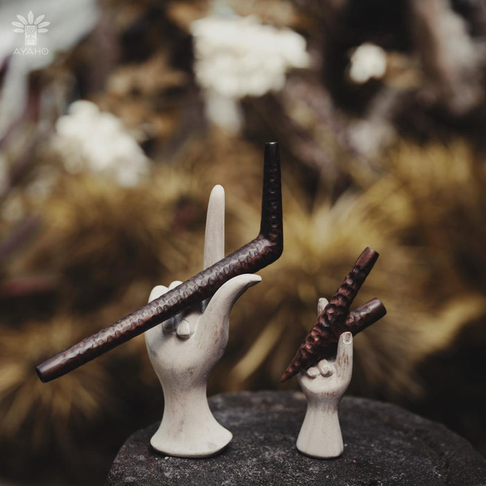 Handcrafted wooden kuripé pipe on natural background