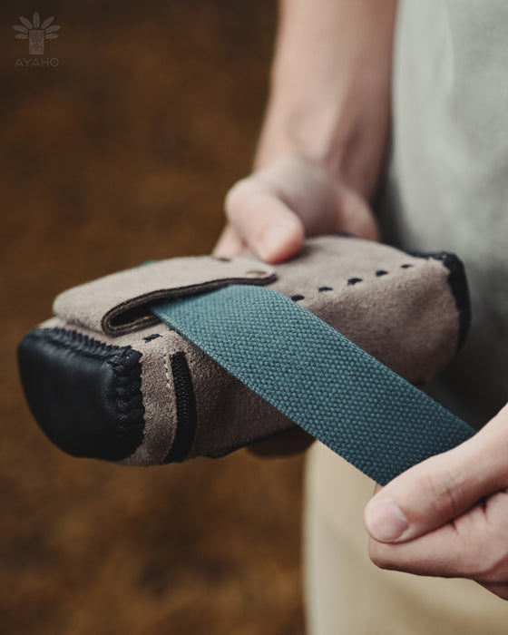 Handmade leather pouch with a belt clip, ideal for storing Rapeh, Kuripe, or small personal items during ceremonies.