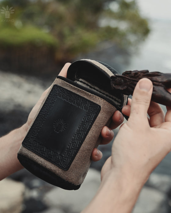 Handmade leather pouch with a belt clip, ideal for storing Rapeh, Kuripe, or small personal items during ceremonies.