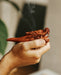 Elegant wood smoking pipe with a dragon design, providing a relaxing smoking experience.