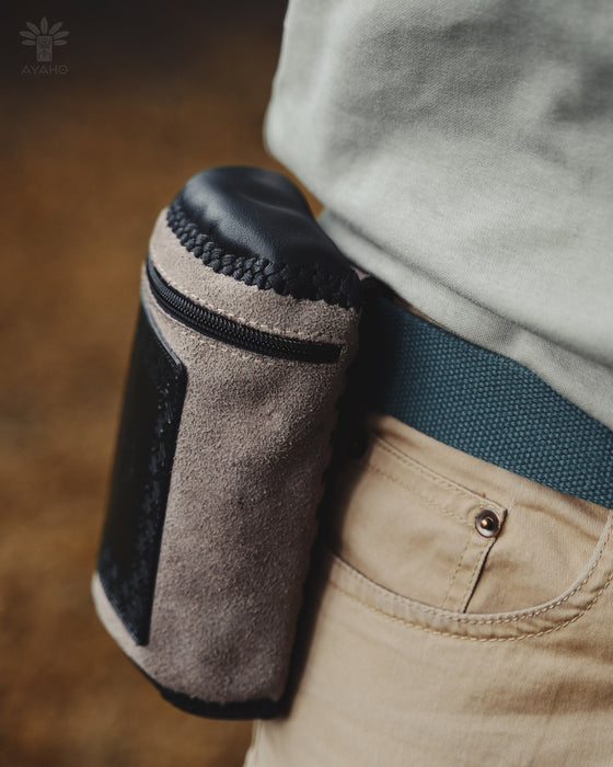 Handmade leather pouch with a belt clip, ideal for storing Rapeh, Kuripe, or small personal items during ceremonies.