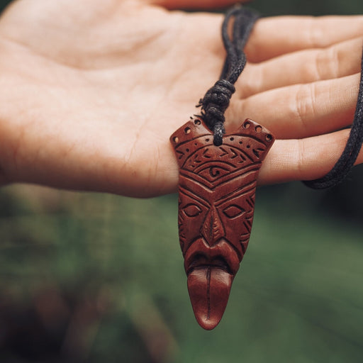 Handcarved sono wood amulet with intricate patterns, Protector Spirit  talisman on a leather cord for luck and protection