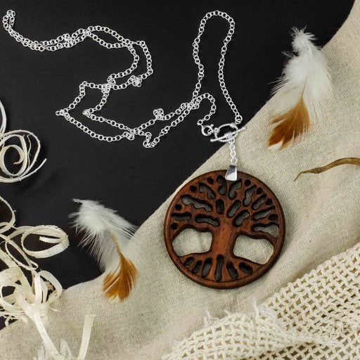 Discover the spiritual elegance of the "Tree of Life" Jewelry Set, handcrafted from rosewood and silver by Bali's Ayaho house. Symbolizing unity, growth, and protection, it's an art piece offering spiritual safeguarding and a connection to nature's essence. 