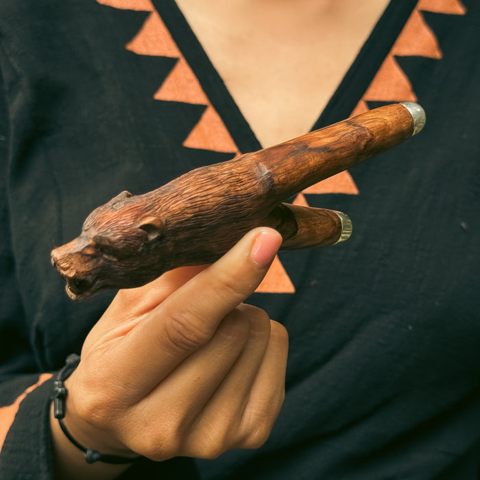 Artisan-crafted kuripe pipe made of mango wood featuring a bear totem design