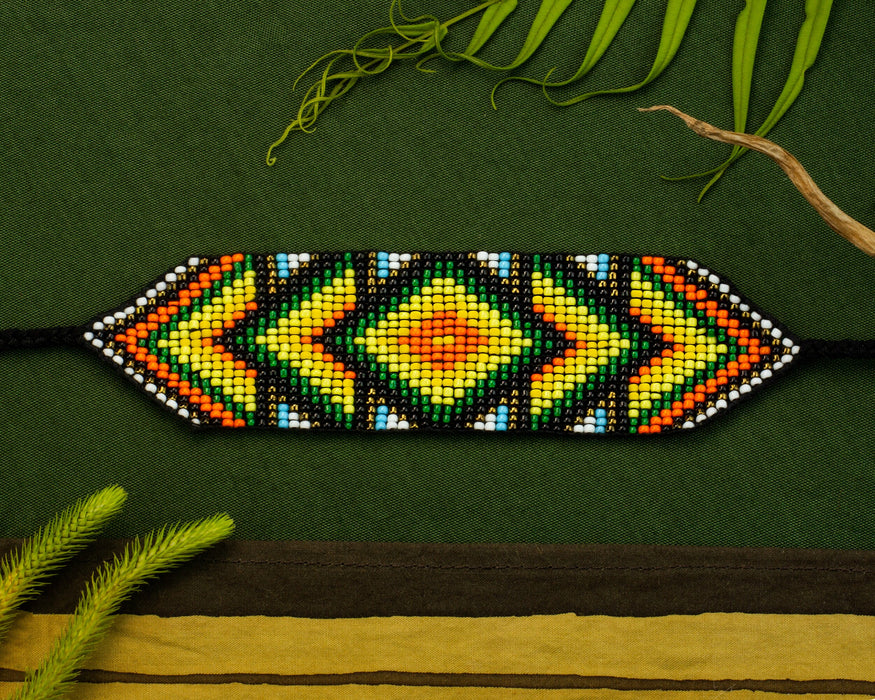 Handwoven bead loom bracelets with Ayahuasca-inspired tribal patterns, combining shamanic tools and talisman amulets for spiritual adornment