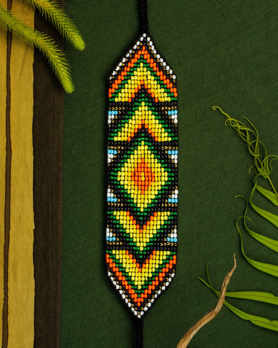 Handwoven bead loom bracelets with Ayahuasca-inspired tribal patterns, combining shamanic tools and talisman amulets for spiritual adornment