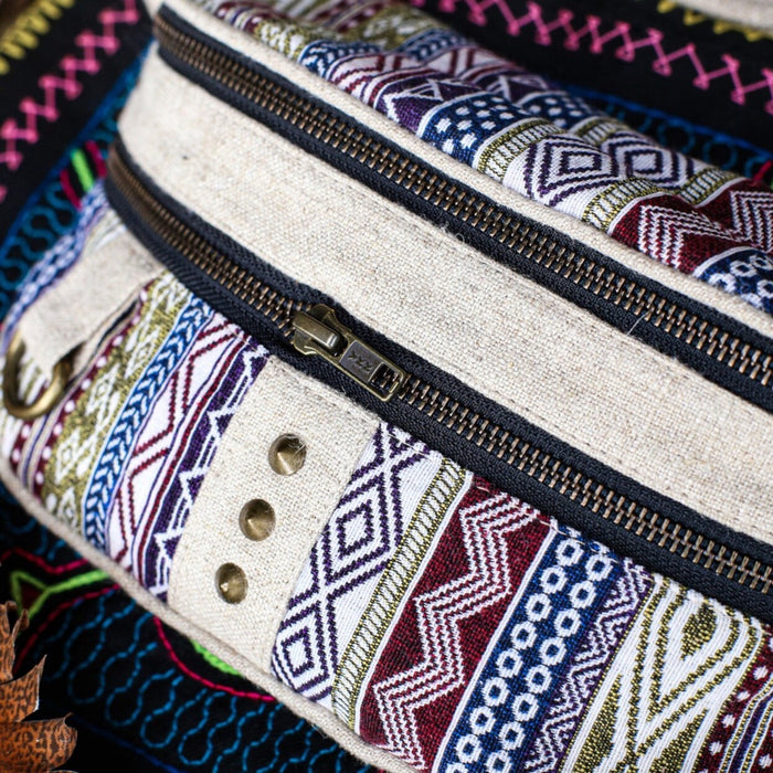 A close-up of a shamanic-inspired belt bag adorned with Mexican motifs, a chic and practical accessory for festivals and everyday adventures