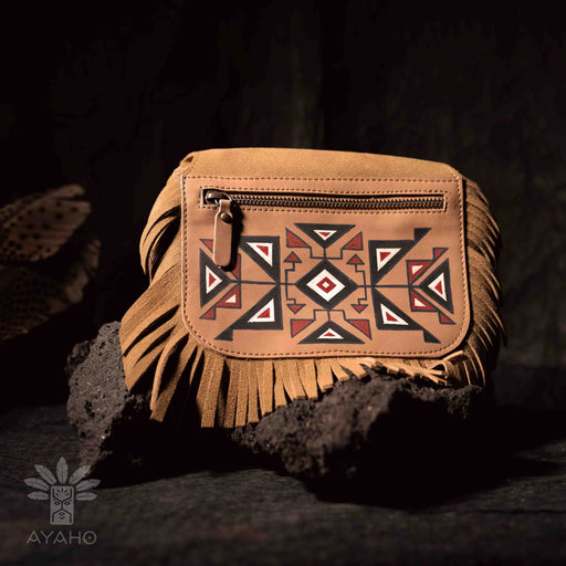 Immerse yourself in the ancient artistry of our Shipibo bag, meticulously handwoven with sacred Indian mandala patterns.