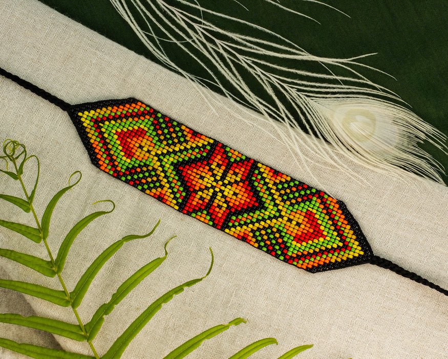 Handwoven bead loom bracelets with Ayahuasca-inspired tribal patterns, combining shamanic tools and talisman amulets for spiritual adornment