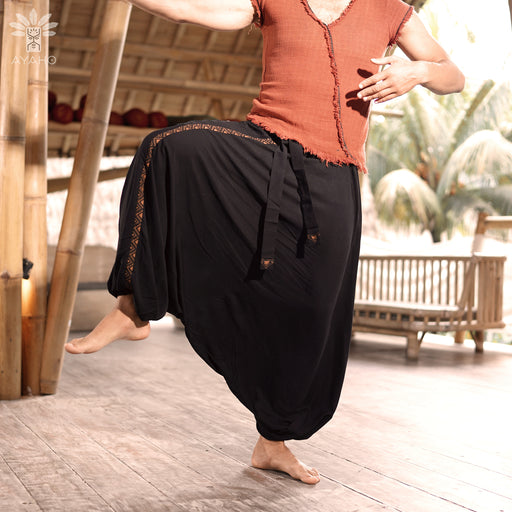 The stylish design of Comfy Boho Pants Alladine, Brown Pattern RAYON adds a trendy touch to your bohemian wardrobe.