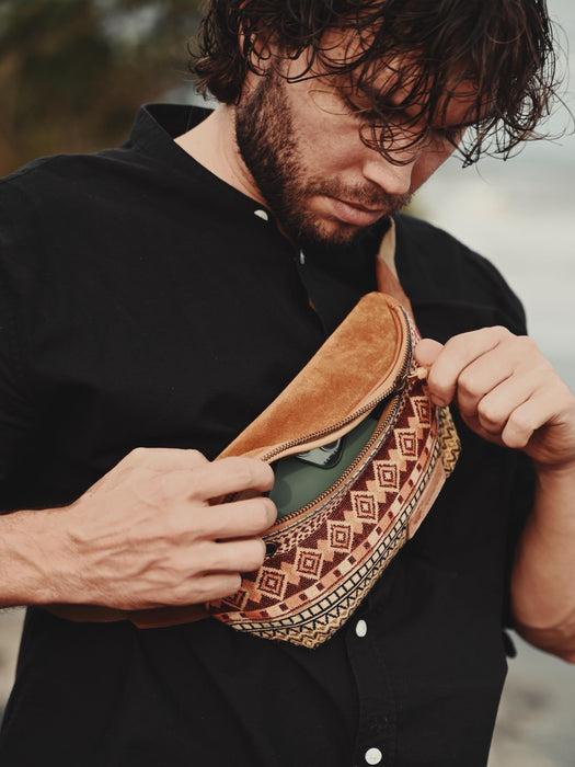 Artisanal ethnic belt bag with secure closures and breathable fabric, blending cultural artistry with modern utility