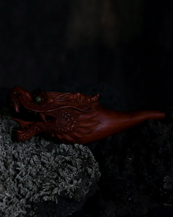 Unique wood smoking pipe with a dragon motif, symbolizing strength and power in your smoking ritual.