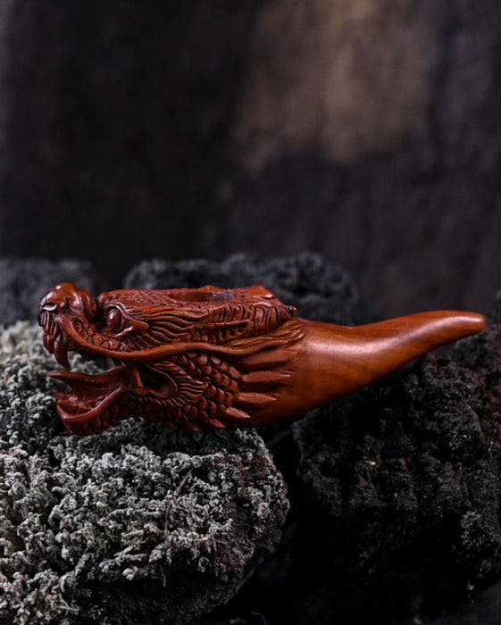 Mythology-inspired wood smoking pipe with a dragon motif, adding a mystical element to your collection.