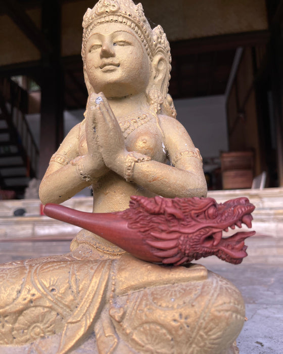 Enhance your smoking ritual with this beautifully crafted dragon smoking pipe, made from premium wood.