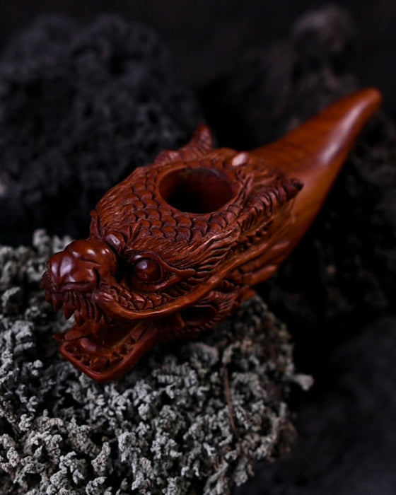 Relax with this beautifully designed wood smoking pipe featuring a dragon, enhancing your smoking experience.