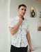 Casual men's shirt featuring vibrant ethnic motifs, combining traditional patterns with a modern fit for a stylish and comfortable look.