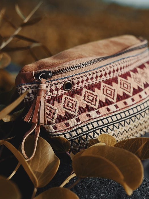 Lightweight yet sturdy handmade waist bag, showcasing cultural patterns and practical storage for phones, wallets, and small items.