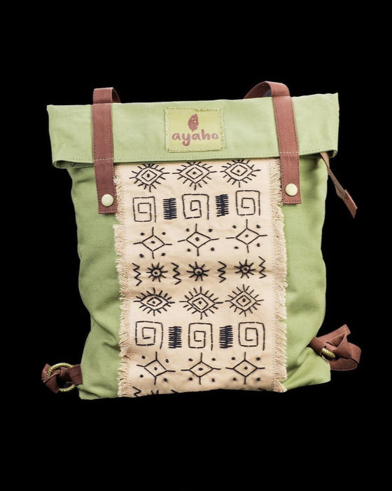 Artisanal ethnic style backpack crafted from natural canvas, featuring distinctive embroidery for the bohemian spirit, ideal for daily ventures and festivals