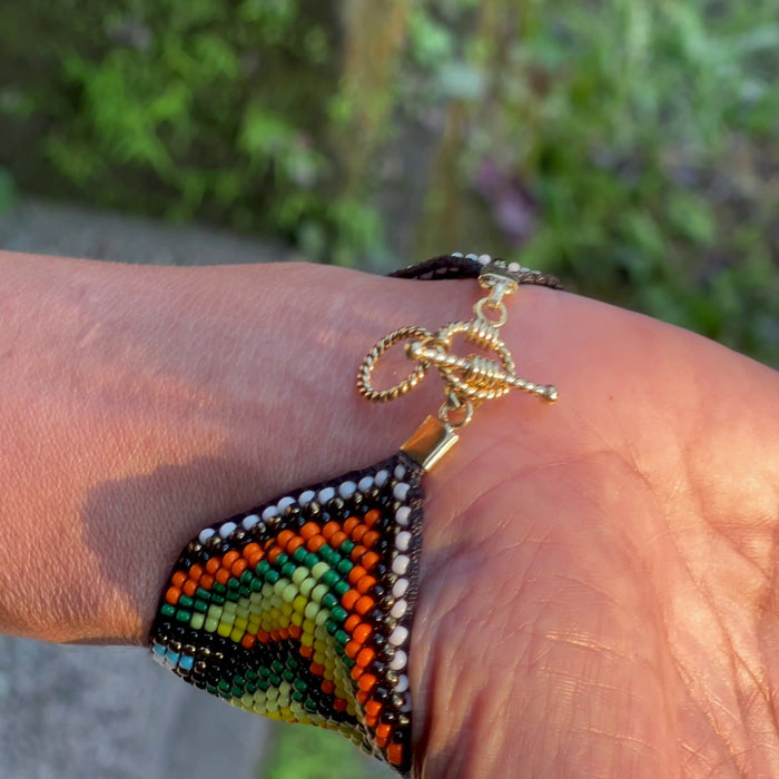 Handwoven bead loom bracelets with Ayahuasca-inspired tribal patterns, combining shamanic tools and talisman amulets for spiritual adornment