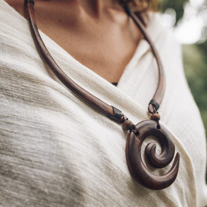 Unlock the "Spiral of Power" with our unique amulet from the House of Ayaho in Bali, crafted from elite sono wood. Symbolizing creativity and life's dynamism, this hand-carved piece serves as a powerful talisman to motivate and protect. Ideal for those valuing artisan beauty and spiritual depth