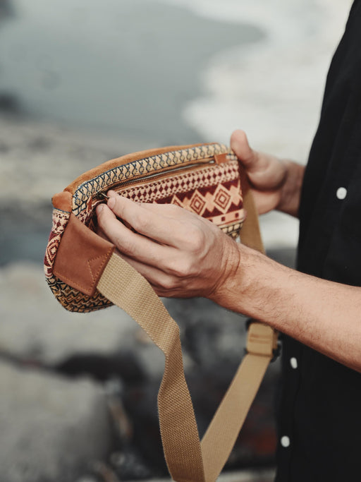 Ethnic-inspired cotton waist pack with reinforced stitching and adjustable fit, ideal for travelers and boho fashion lovers