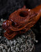 Handcrafted wood smoking pipe with elegant dragon carvings, combining quality and artistic flair.