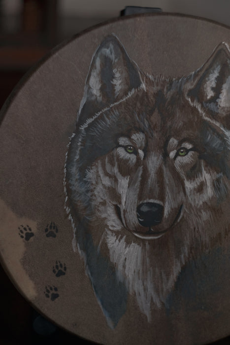 Perfect gift for spiritual seekers, this handcrafted shaman drum features a striking wolf design for meaningful use.
