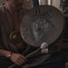 Exquisite handcrafted shaman drum featuring a striking wolf design, perfect for enhancing your spiritual practice.