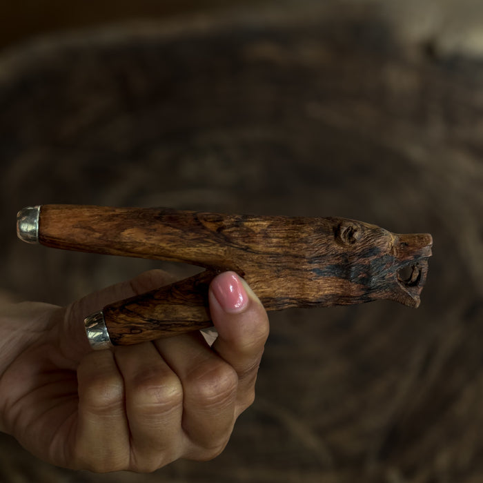 Handcrafted kuripe smoking pipe with a bear totem, made from mango wood.