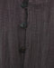 Close-up of a textured dark brown fabric with buttons, featuring the Ayarial brand logo.