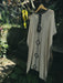Ayaho unisex kimono poncho featuring sacred embroidery on soft natural cotton, reflecting slow fashion and nature-inspired design