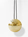 Gold spherical pendant light on a white background
