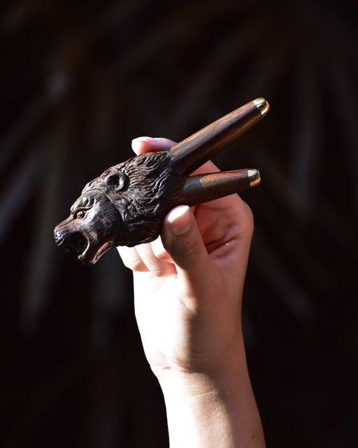 Unleash the lion’s strength with this totemic Rosewood Kuripe, handcrafted with silver tips for hape ceremonies, a majestic addition to your spiritual toolkit.