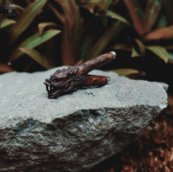 Hand-carved dragon totem kuripe, a shamanic rapéh applicator pipe, used in sacred ayahuasca ceremonies for spiritual healing, meditation, and as a unique herbal medicine tool.