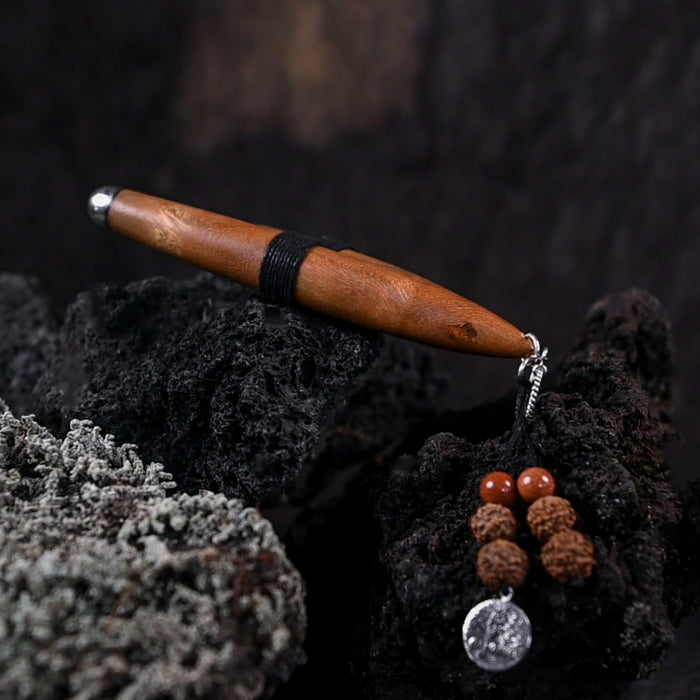 The kuripe, doubling as a necklace with detailed charms, represents both a shamanic tool and a unique gift.