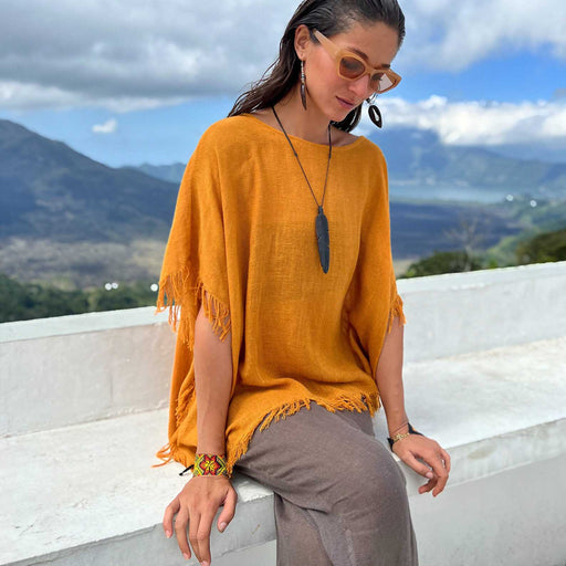 Immerse yourself in the essence of Boho chic with our Boho Poncho and Linen Wide Leg Pants - your go-to ensemble for embracing freedom and elegance