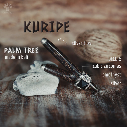 Bali-made wooden kuripe pipe with elegant silver tips and a black onyx stone, showcased as a unique, handcrafted hape snuff applicator and shamanic tool.